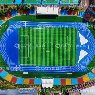La IAAF aprobó la pista de atletismo de caucho de sándwich revestida con spray azul para campos deportivos.